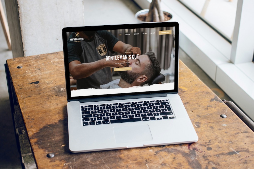Websites eines Barbershop für Männer präsentiert auf einem Laptop
